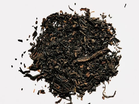 A pile of loose-leaf black tea.